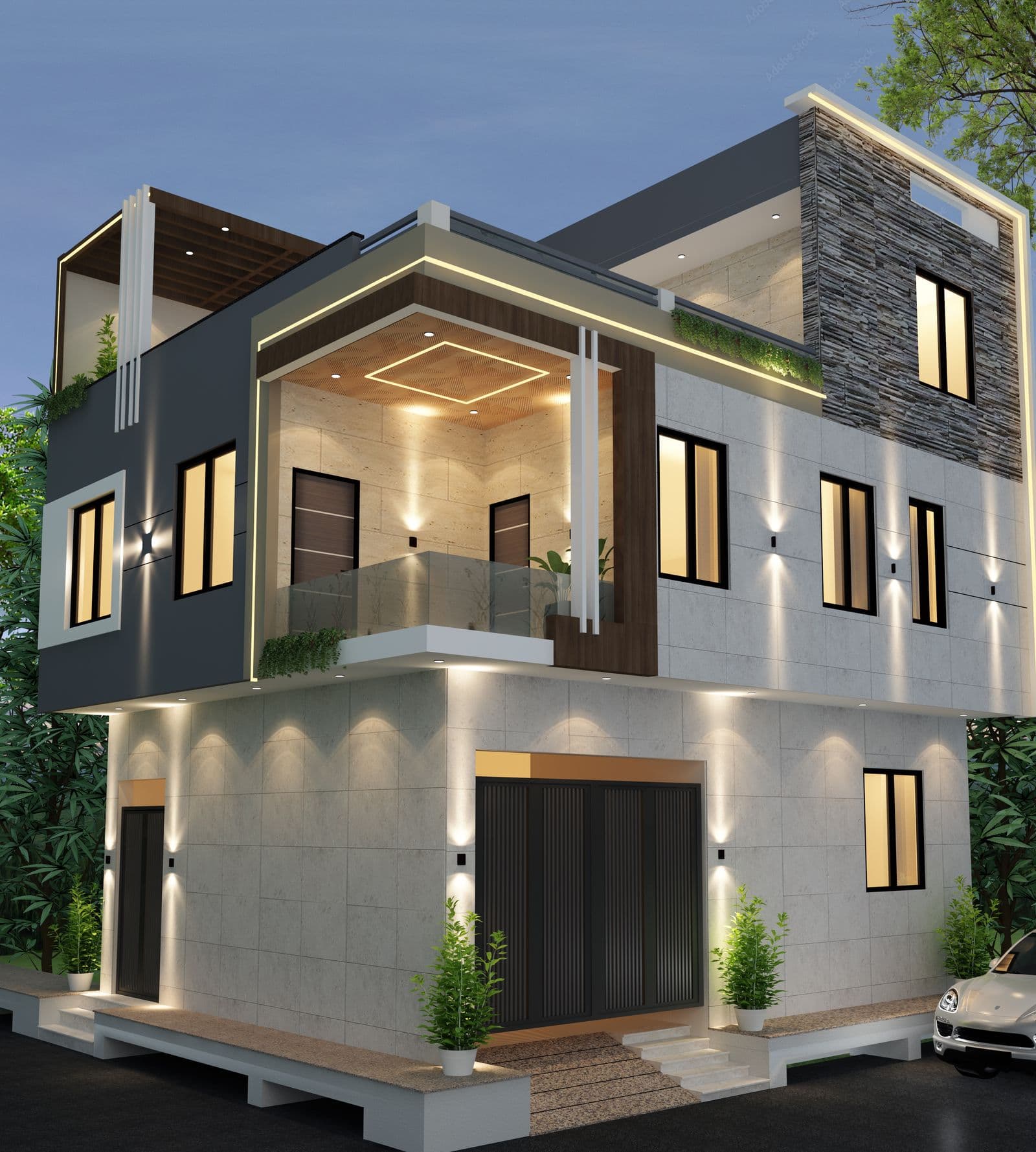 Contemporary duplex home illuminated at dusk